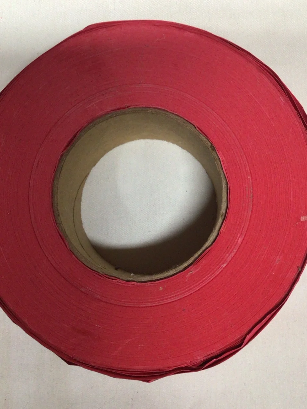 Source Unknown Red Raffle Ticket Roll with Black Print